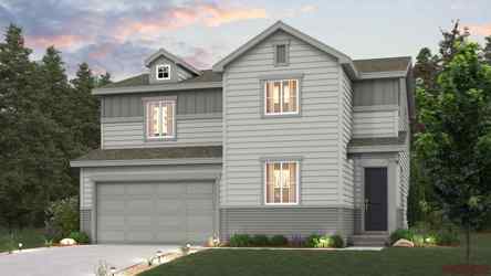 A grey house with a garage.
