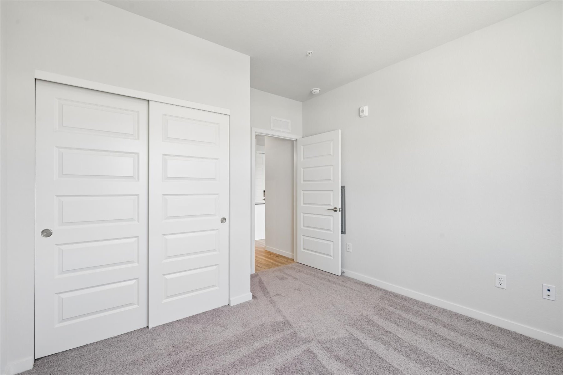 A room with white doors.