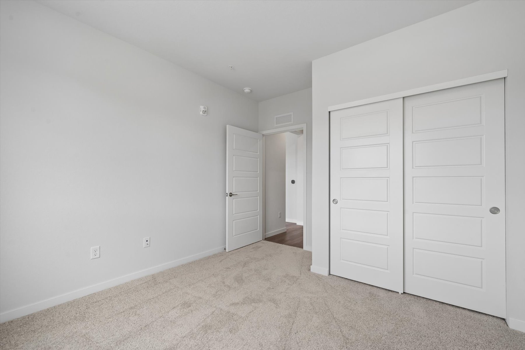 A room with white doors.