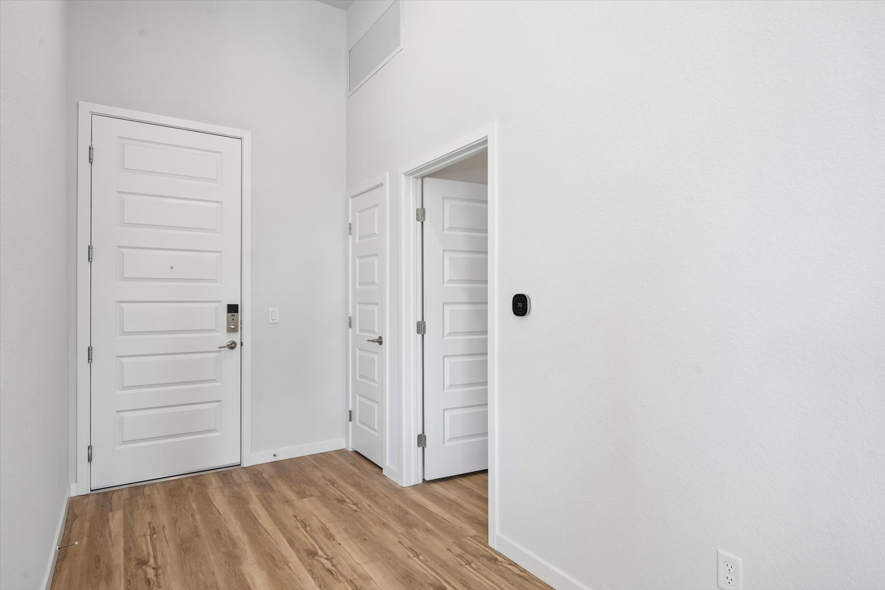 A room with white doors.