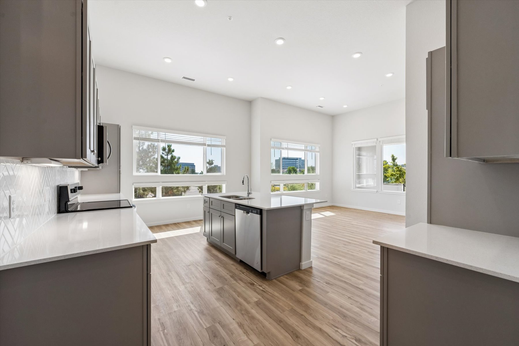 A kitchen with wooden floors.