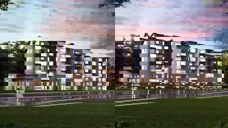 A building with a fountain in front.