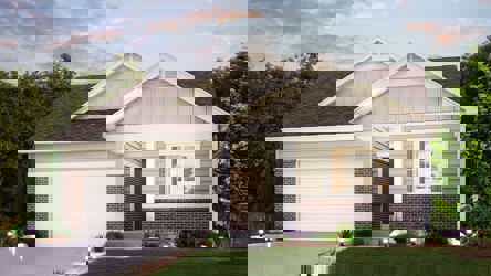 A house with a lawn and trees.