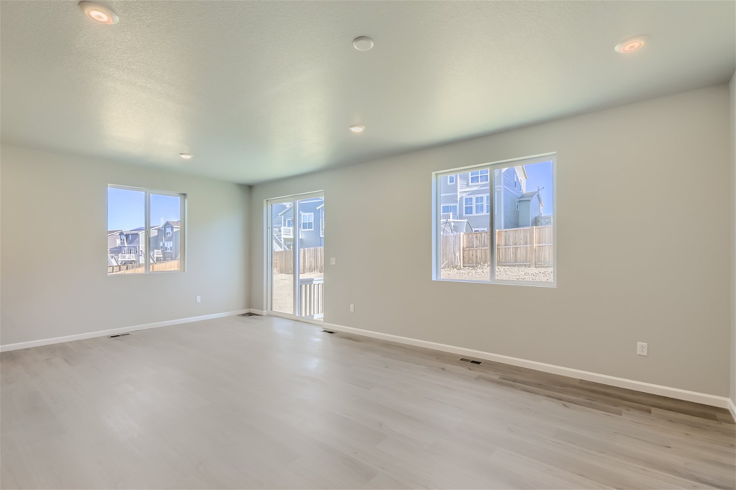 A room with a few windows.