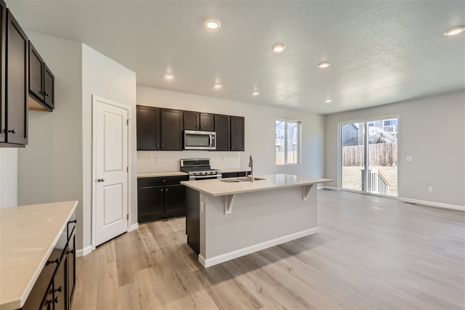 A kitchen with a large island.