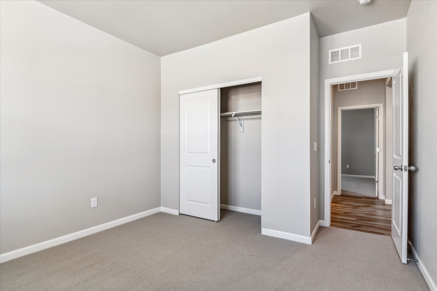 A room with white doors.
