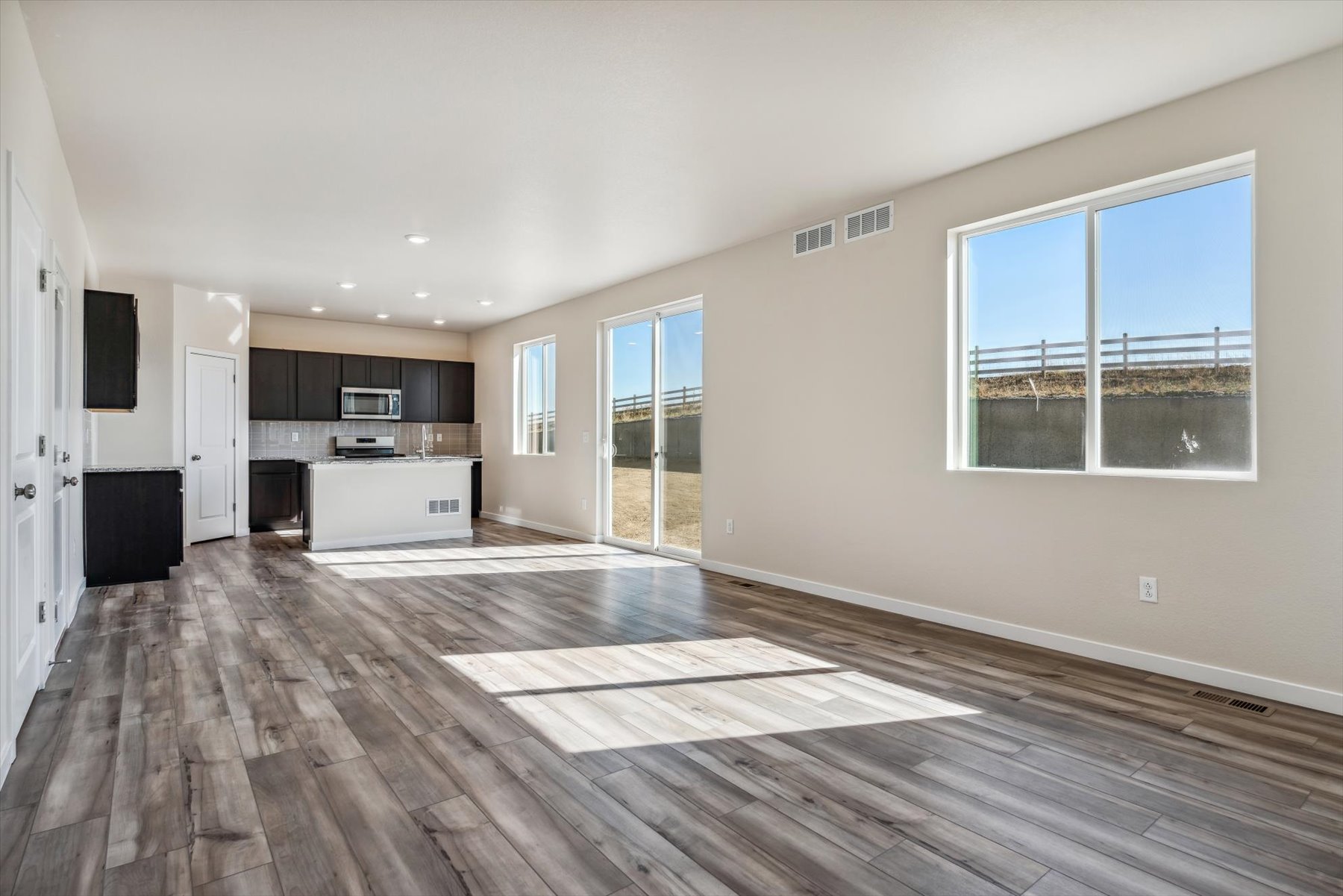 A large empty living room.