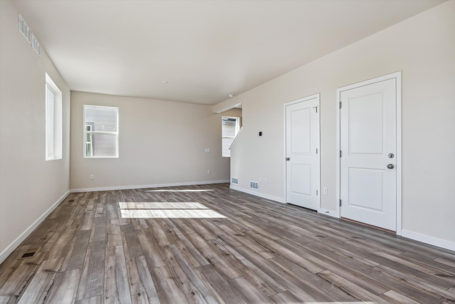 A room with white doors.