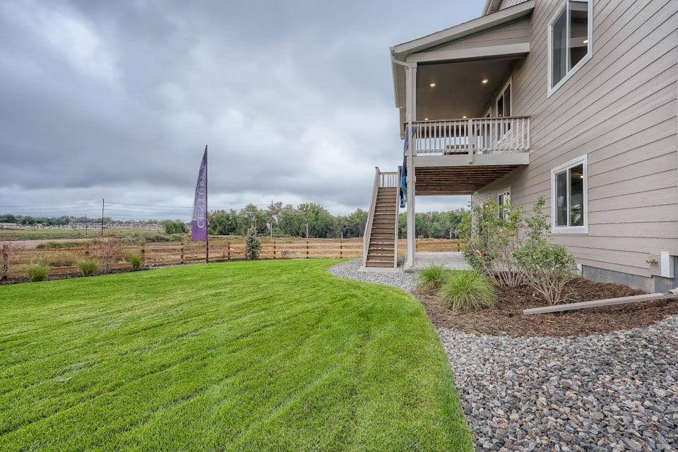 A house with a grass yard.