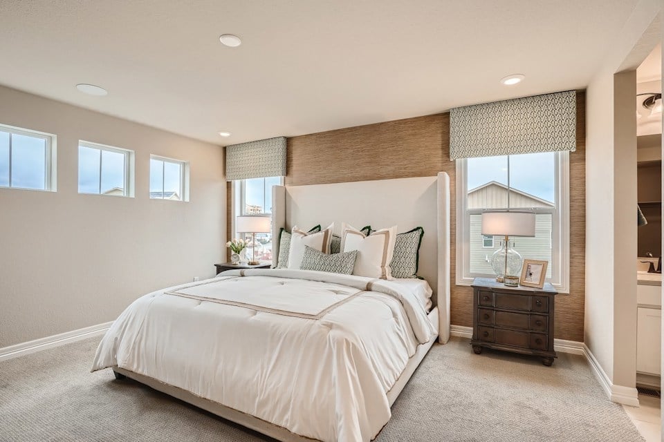 A bedroom with a large bed.