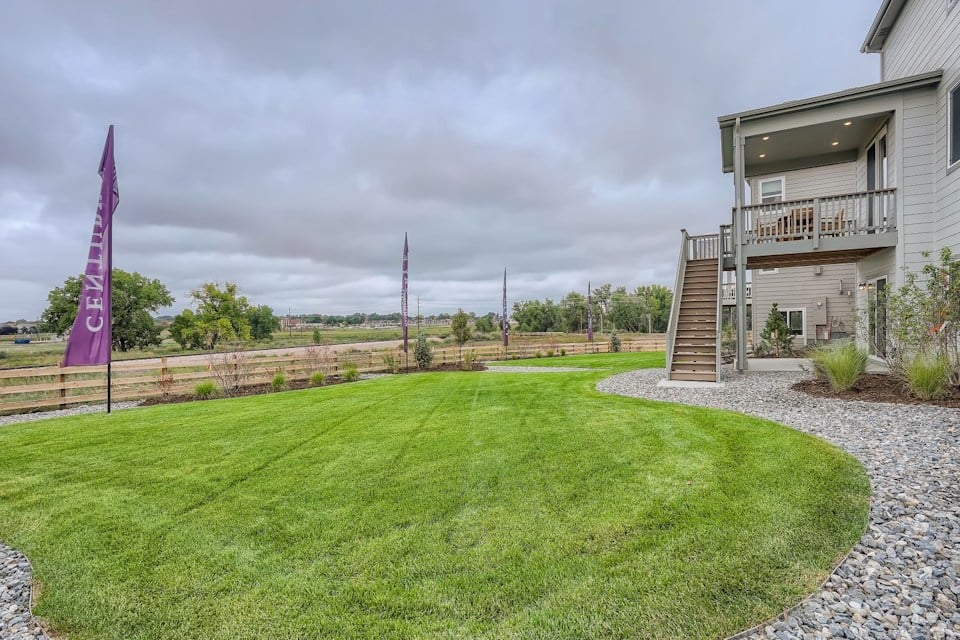 A grassy area next to a building.