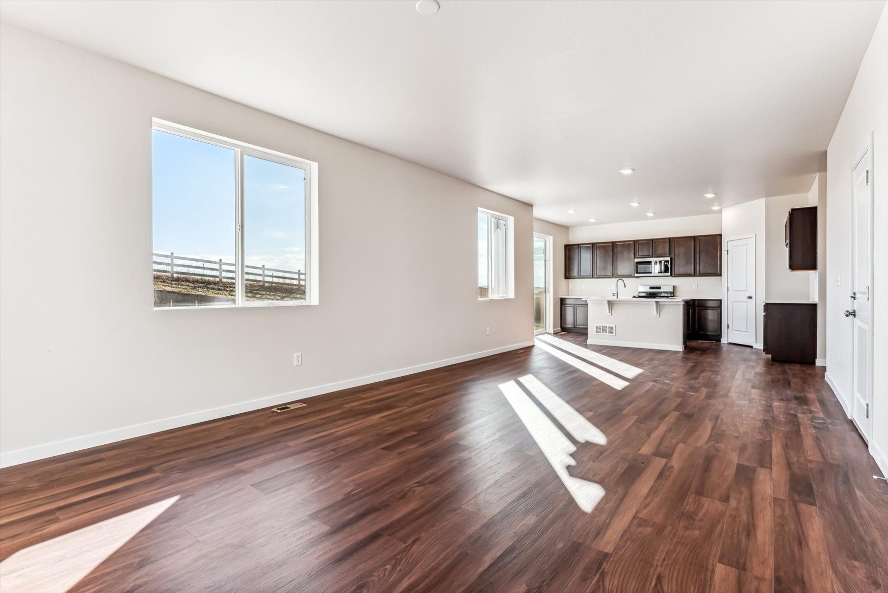 A large empty living room.