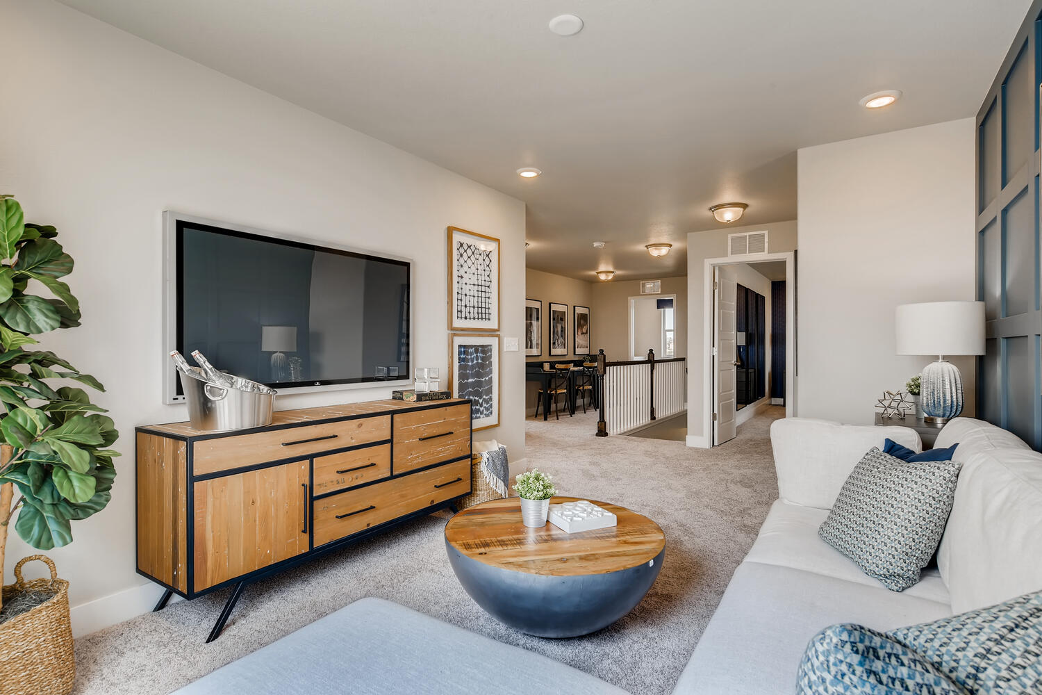 A living room with a tv and a couch.
