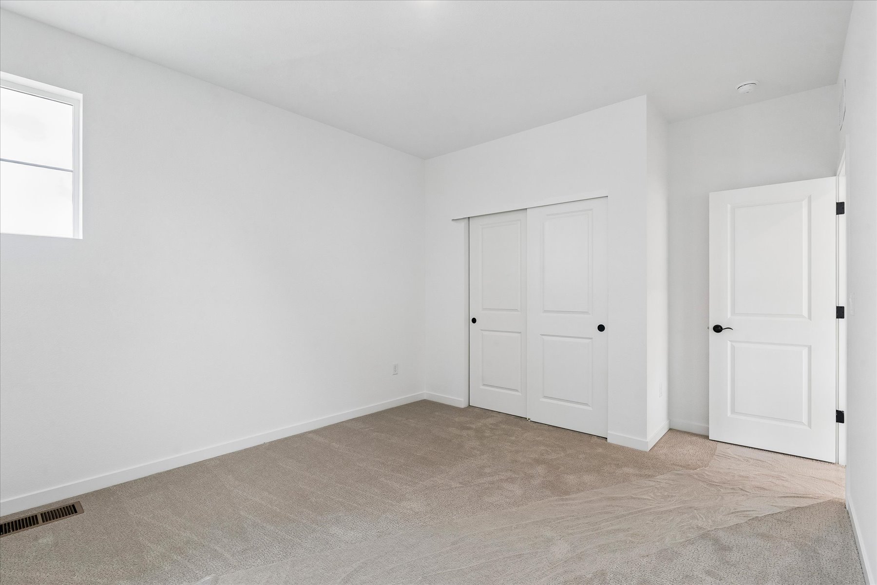 A room with white doors.