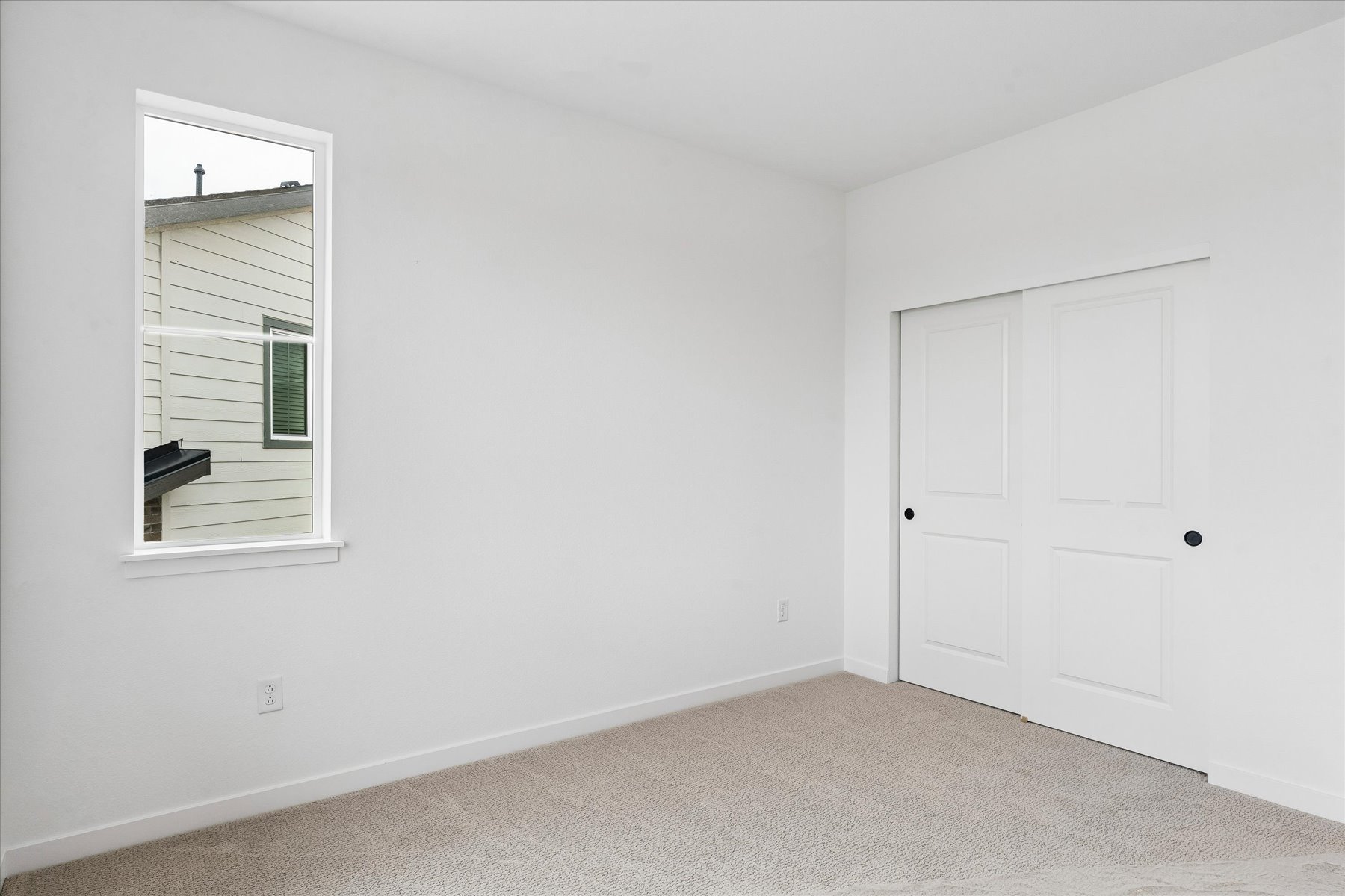 A room with white doors.