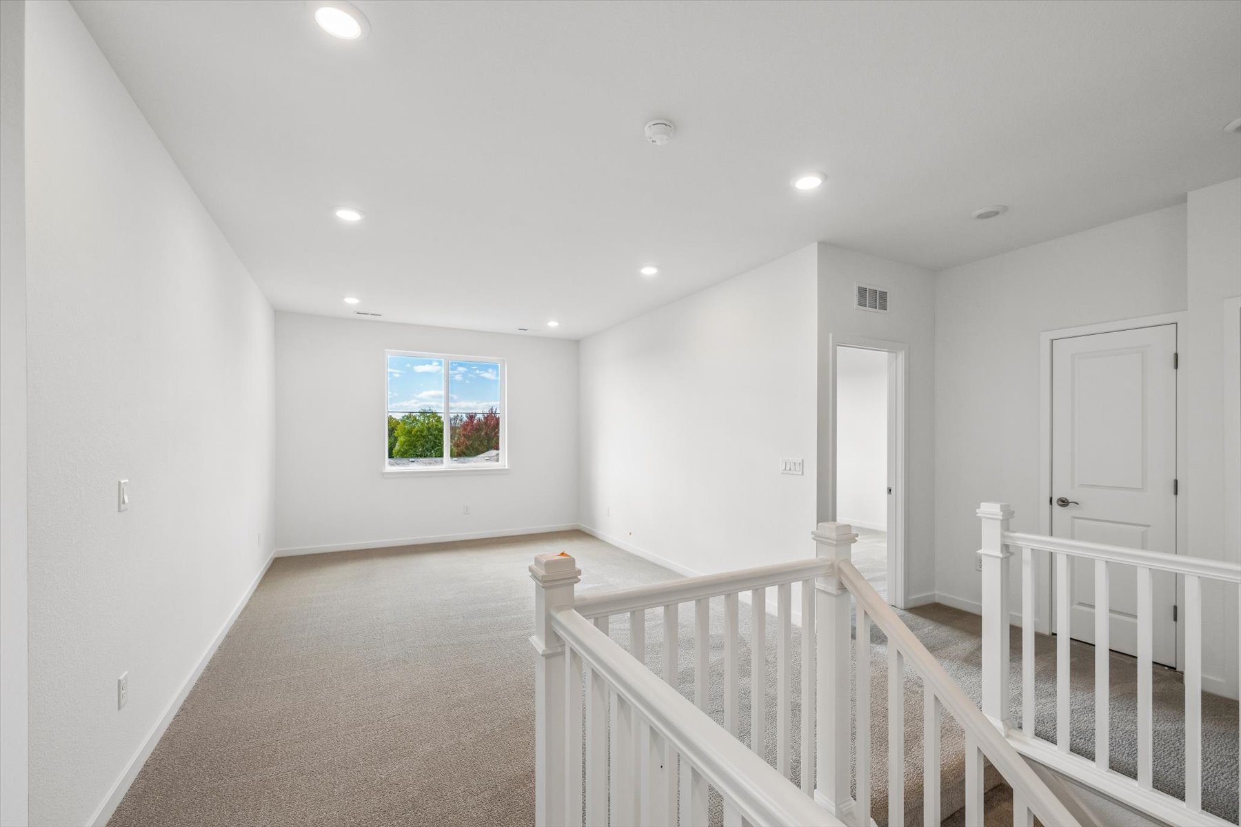 A white staircase in a house.