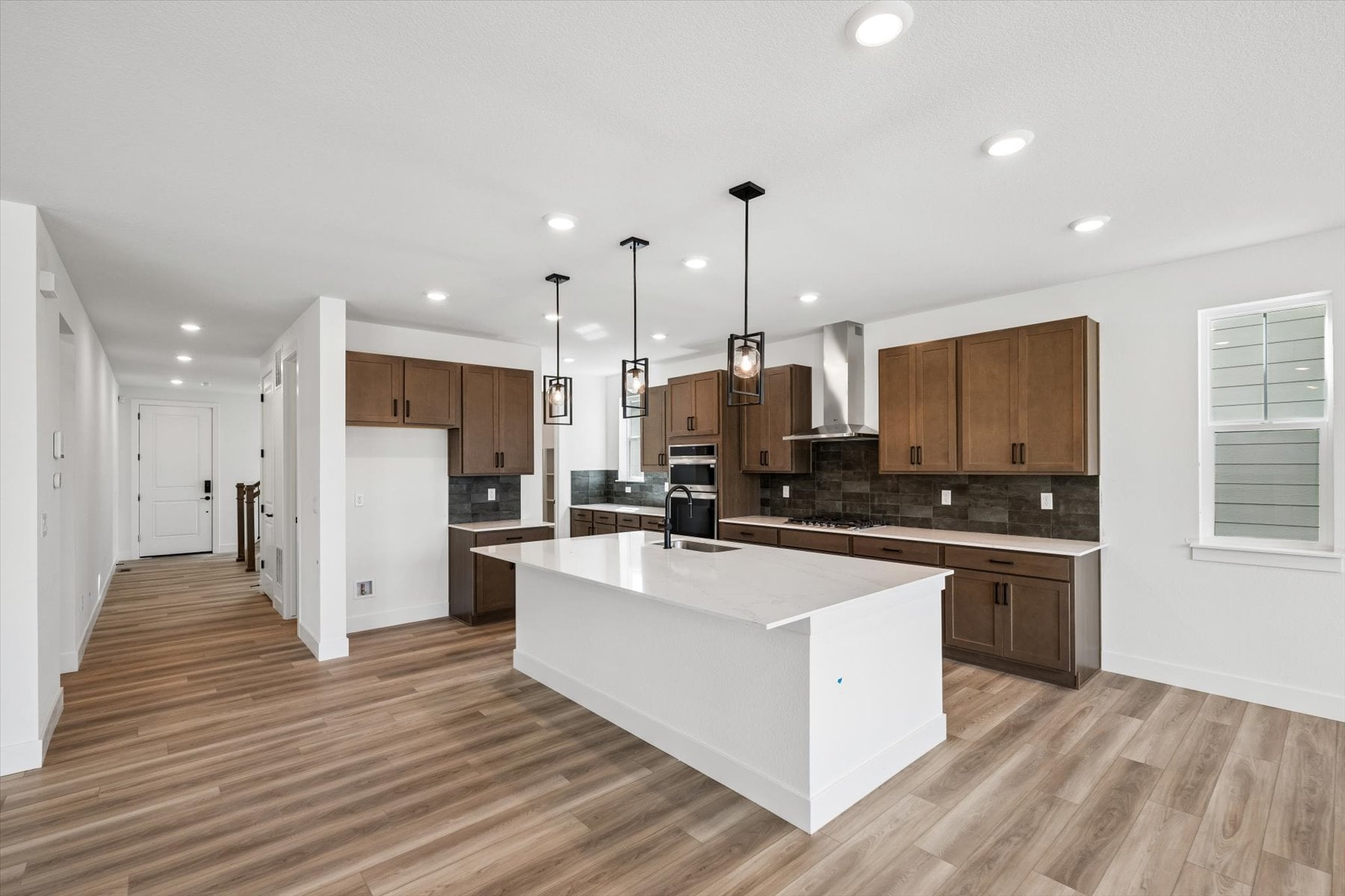 A kitchen with a large island.