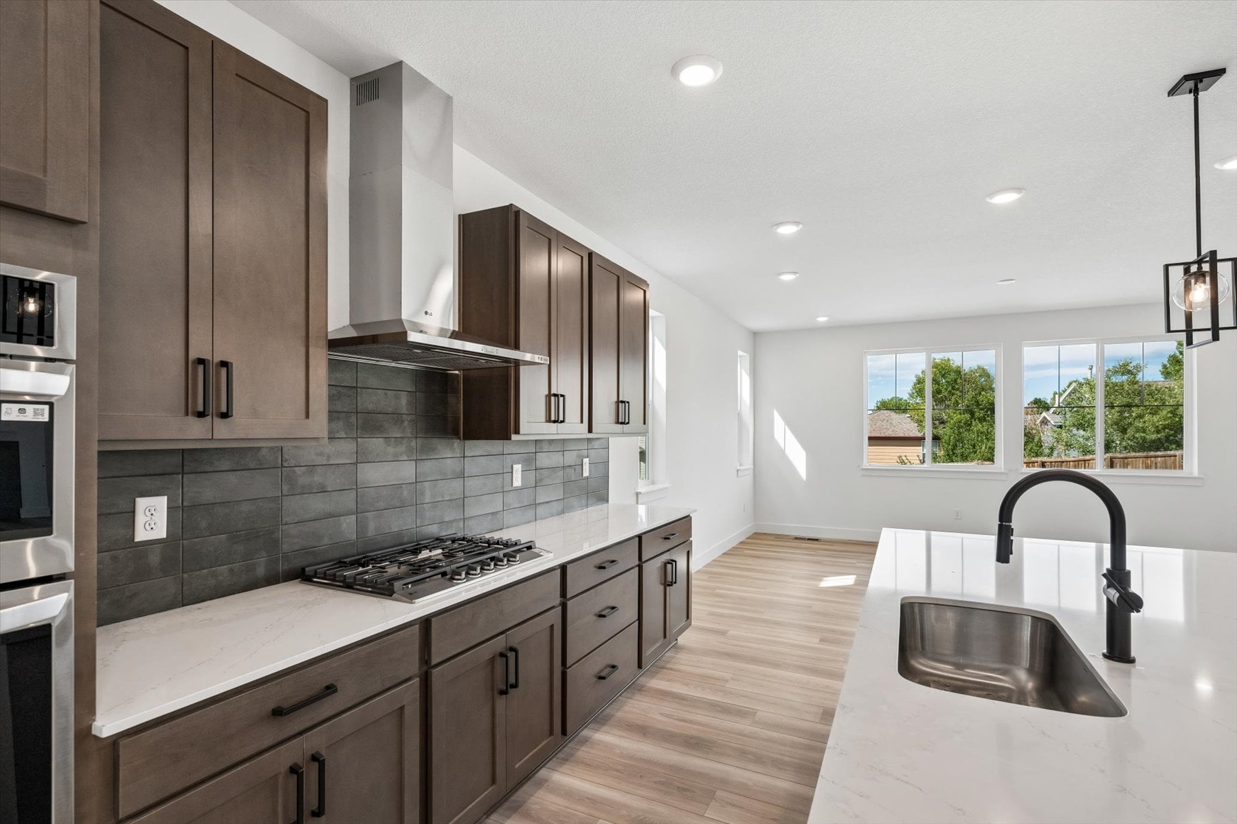 A kitchen with a sink and cabinets.