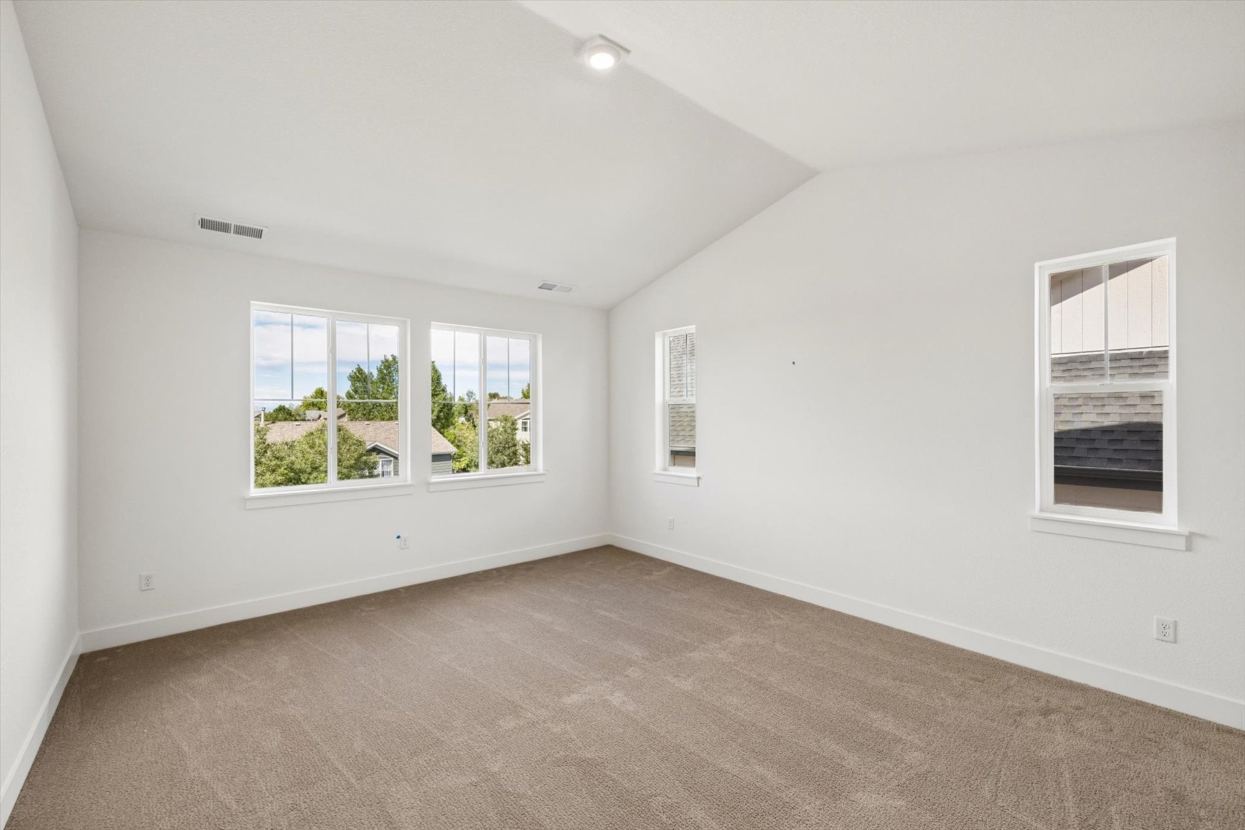 A room with a window and a door.