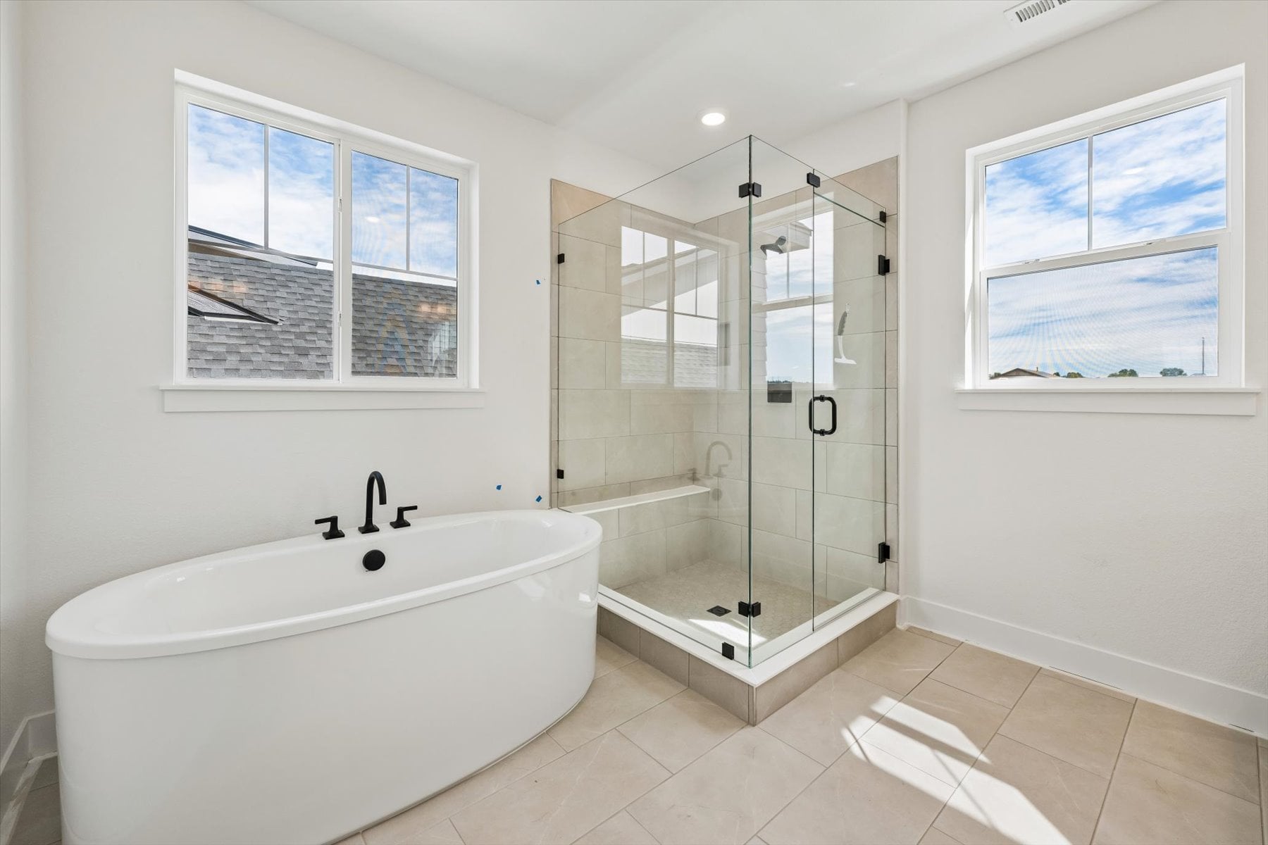 A bathroom with a glass shower.