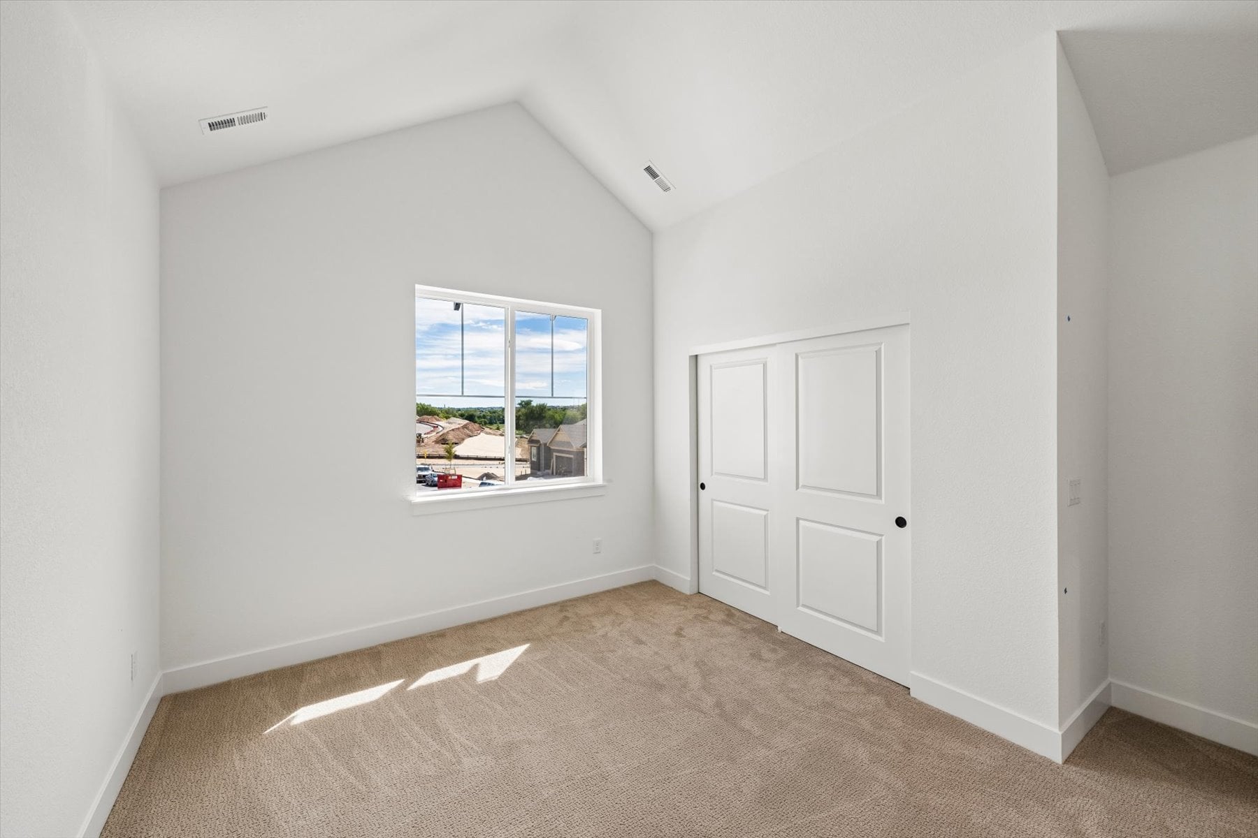 A room with white doors.