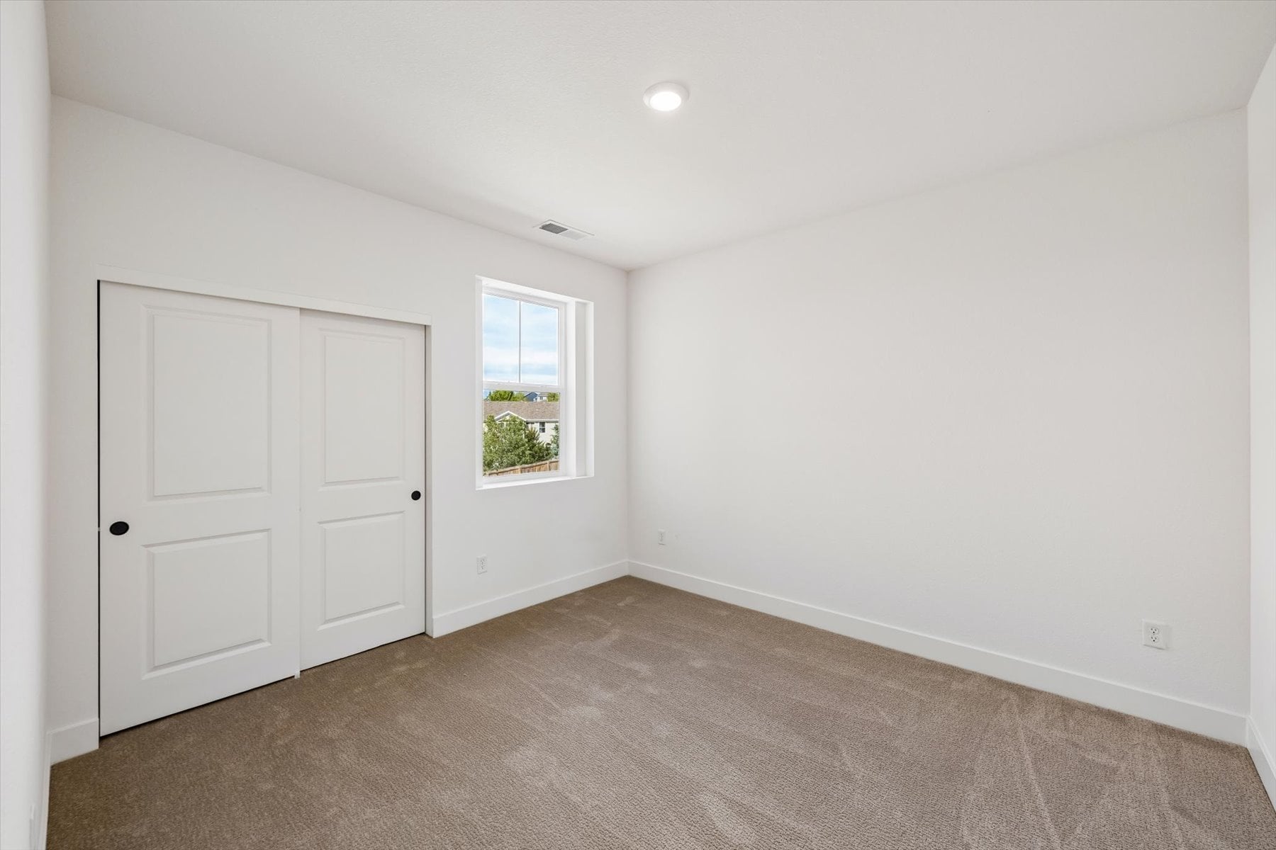 A room with white doors.