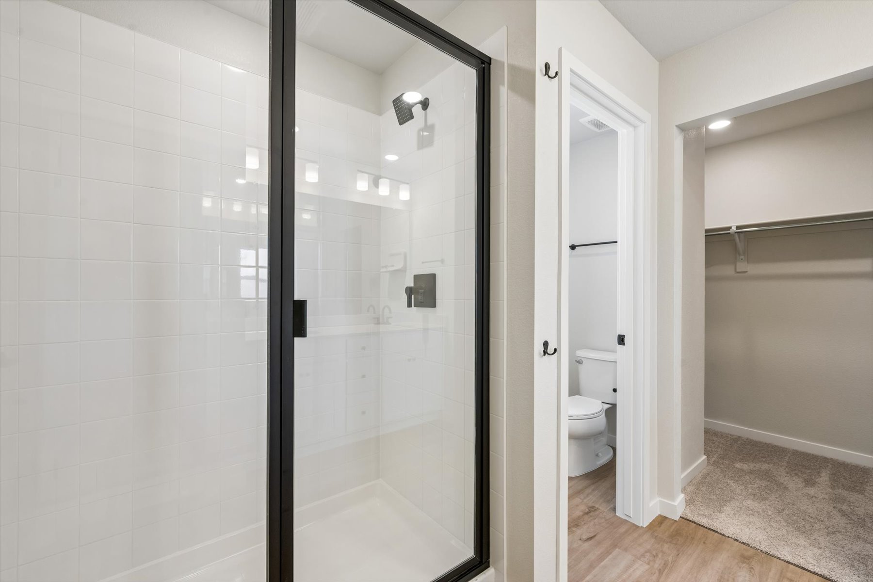 A bathroom with a glass shower.