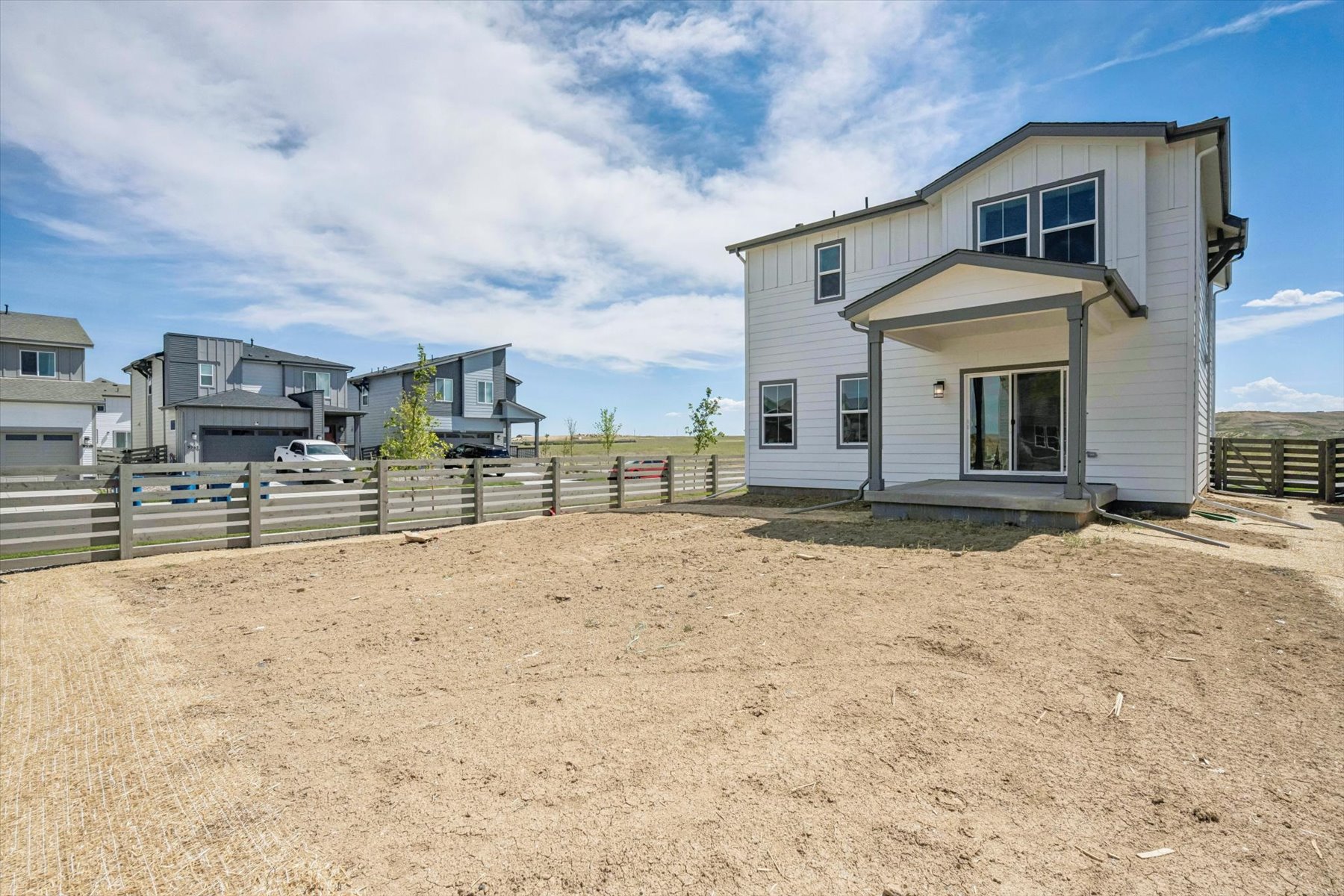A house with a fence around it.