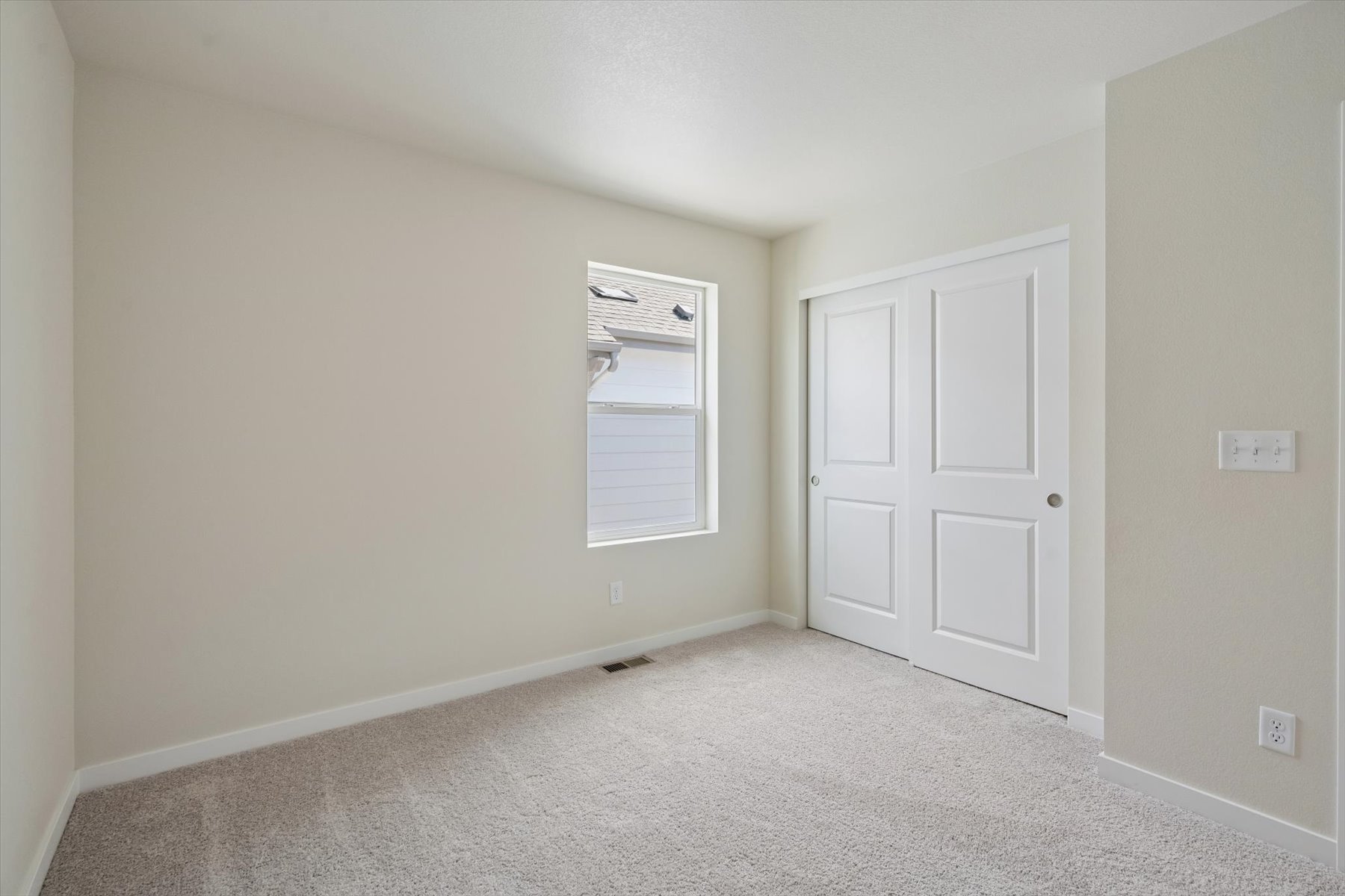 A room with white doors.