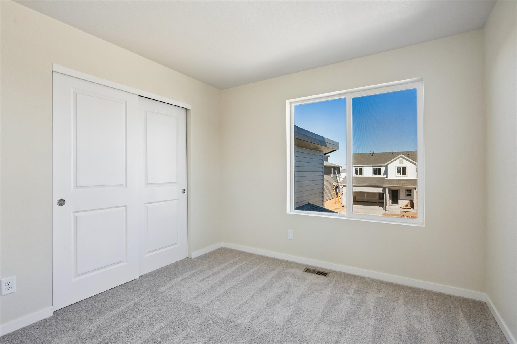 A room with white doors.