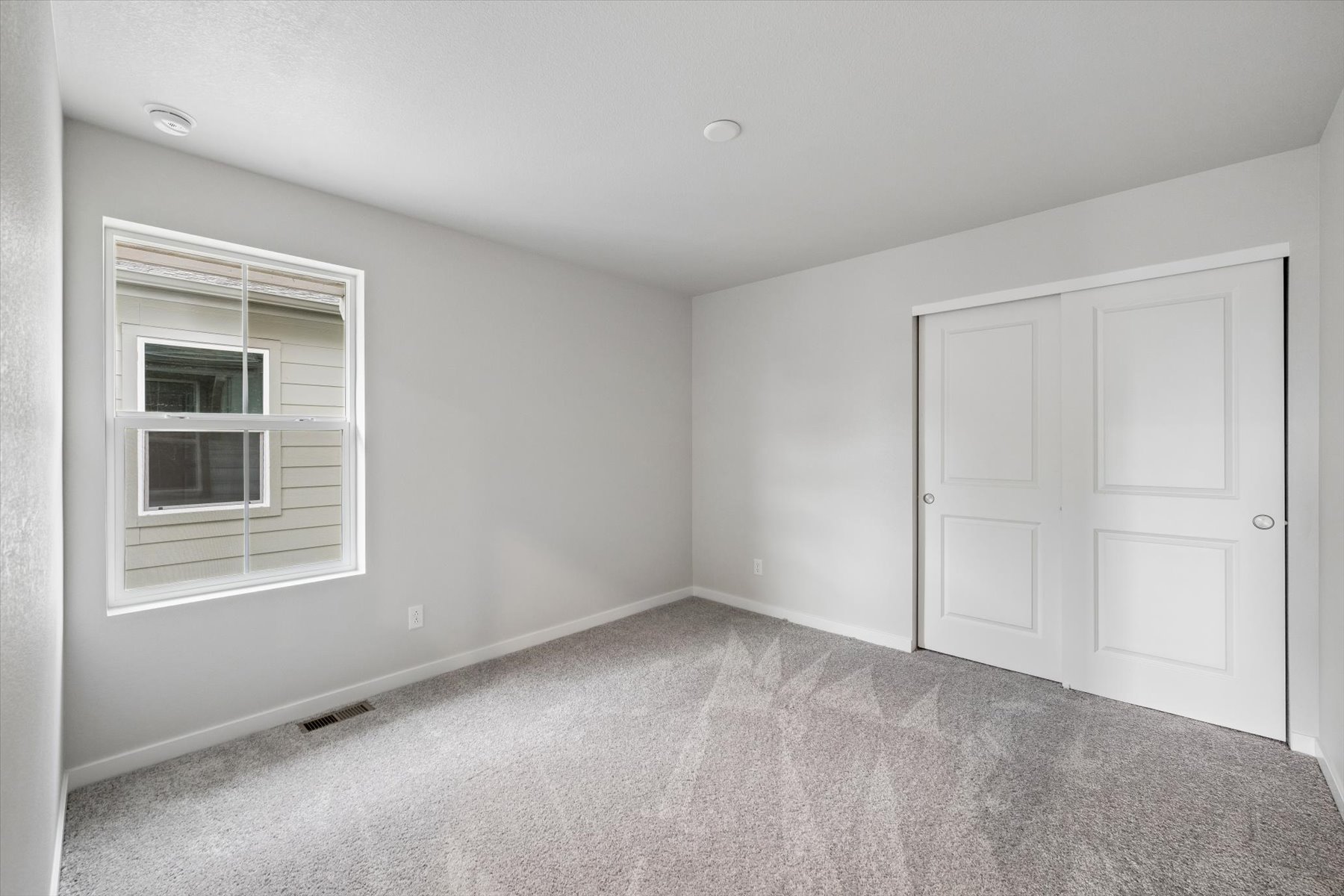 A room with white doors.