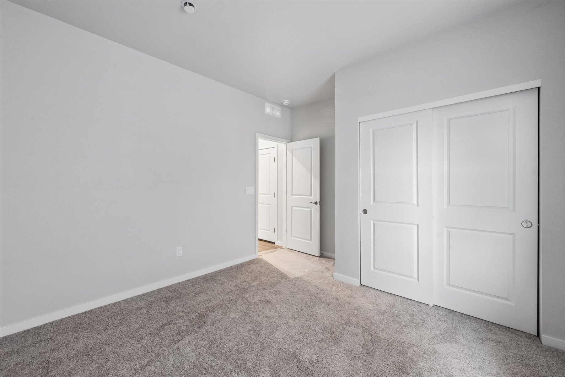 A room with white doors.