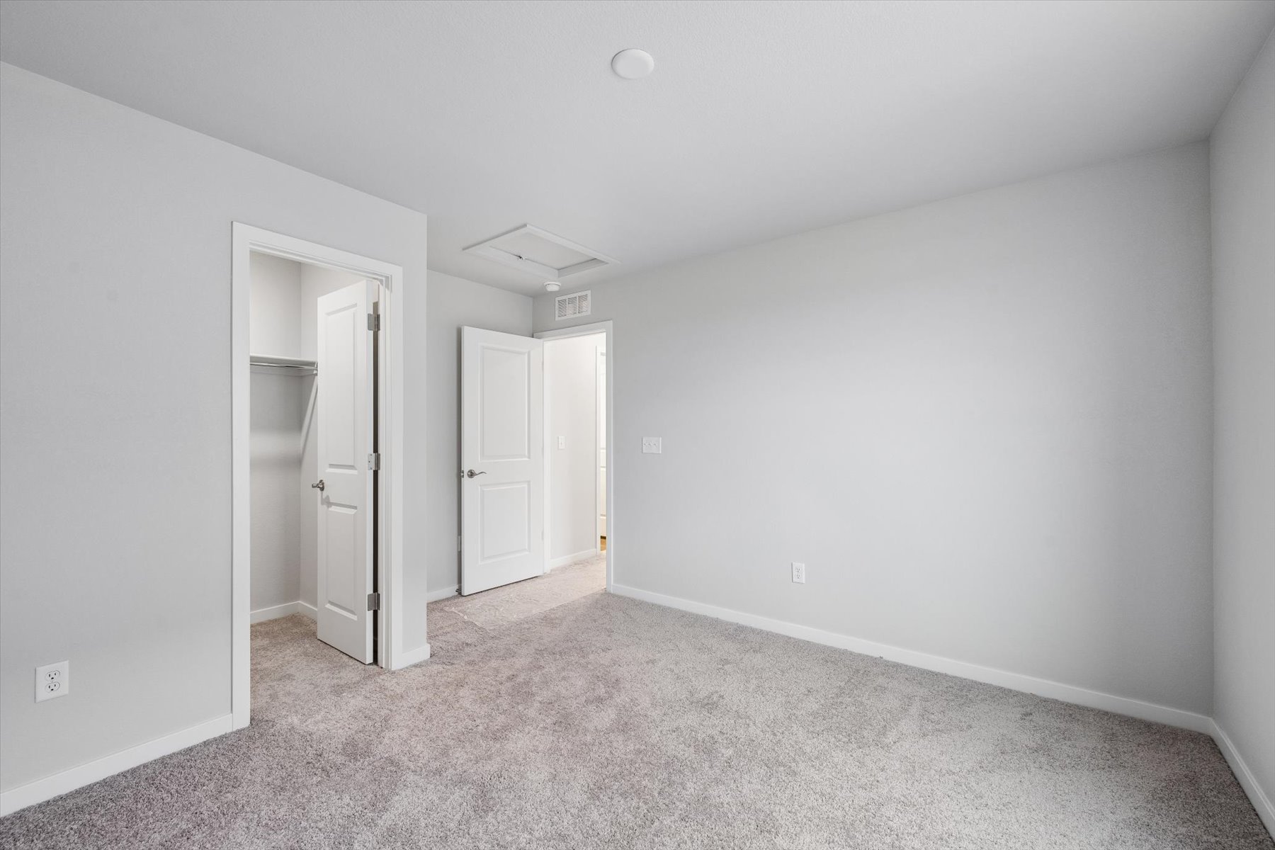 A room with white doors.