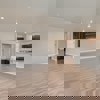Great room and kitchen of the ranch style Telluride plan by Century Communities