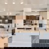 Kitchen of the ranch style Telluride plan by Century Communities
