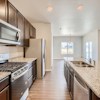 Kitchen and breakfast nook of the ranch style Telluride plan by Century Communities