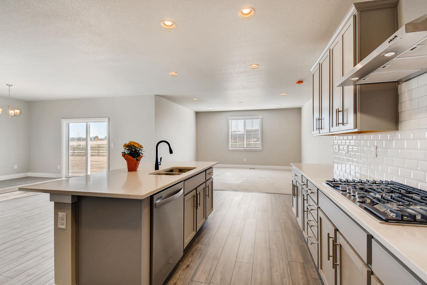 A kitchen with white walls.