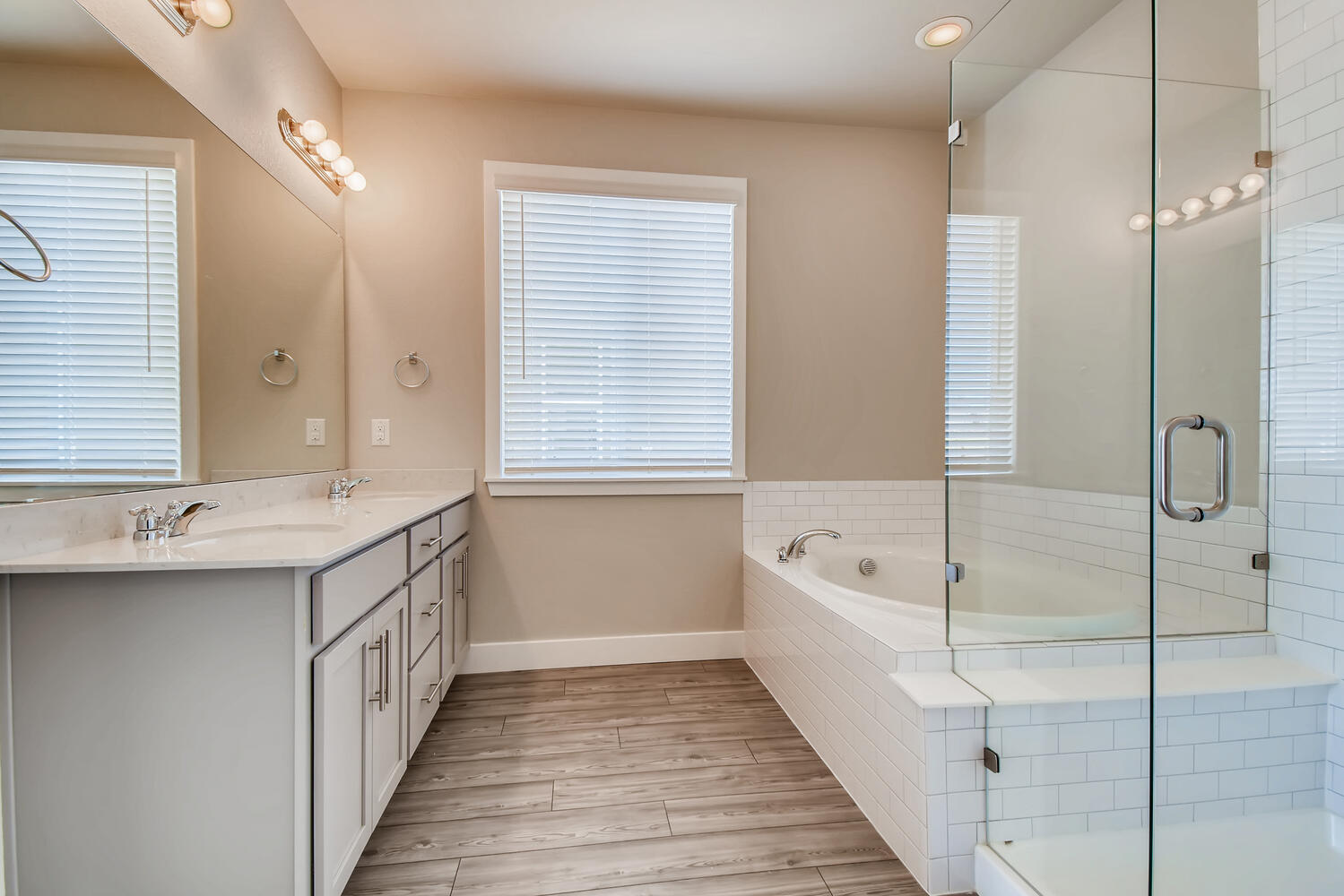 A bathroom with a tub and sink.
