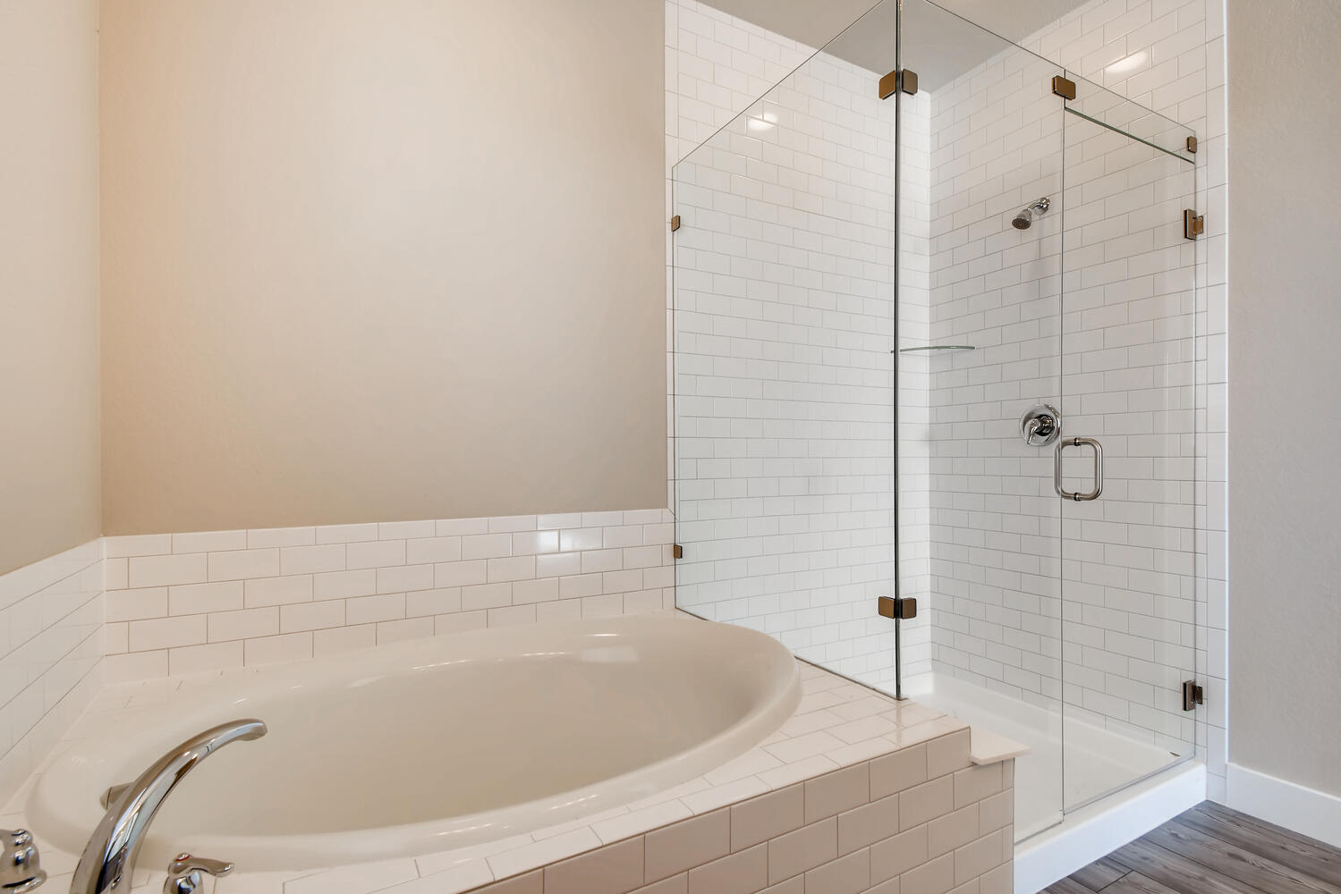 A bathroom with a glass shower.