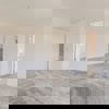 Primary bedroom in Cornell II plan at The Outlook at Southshore by Century Communities