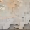 Primary bathroom in Cornell II plan at The Outlook at Southshore by Century Communities