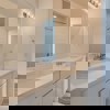 Upstairs hall bath in Cornell II plan at The Outlook at Southshore by Century Communities