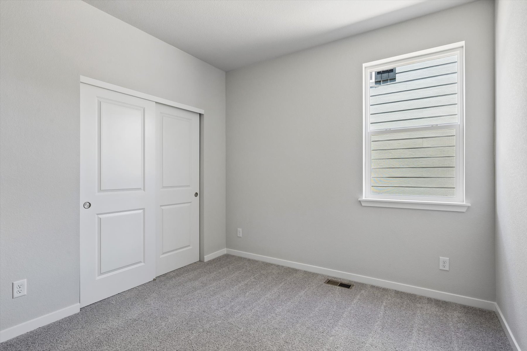 A room with white doors.