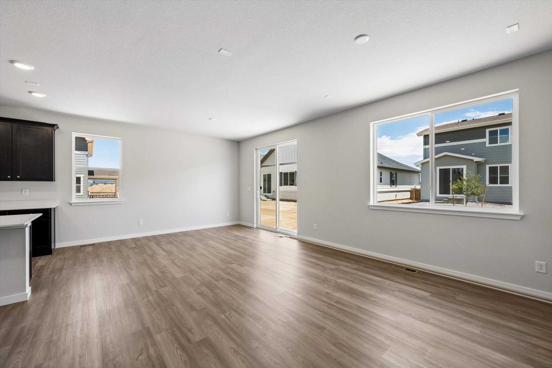 A room with a wood floor and a wood floor.
