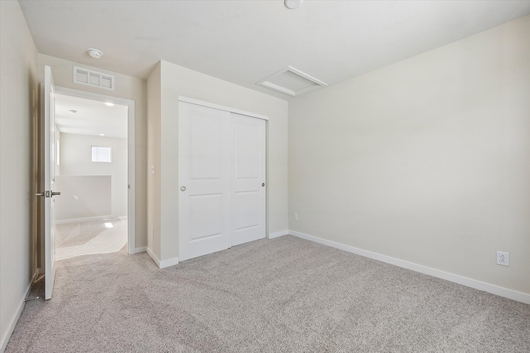 A room with white doors.
