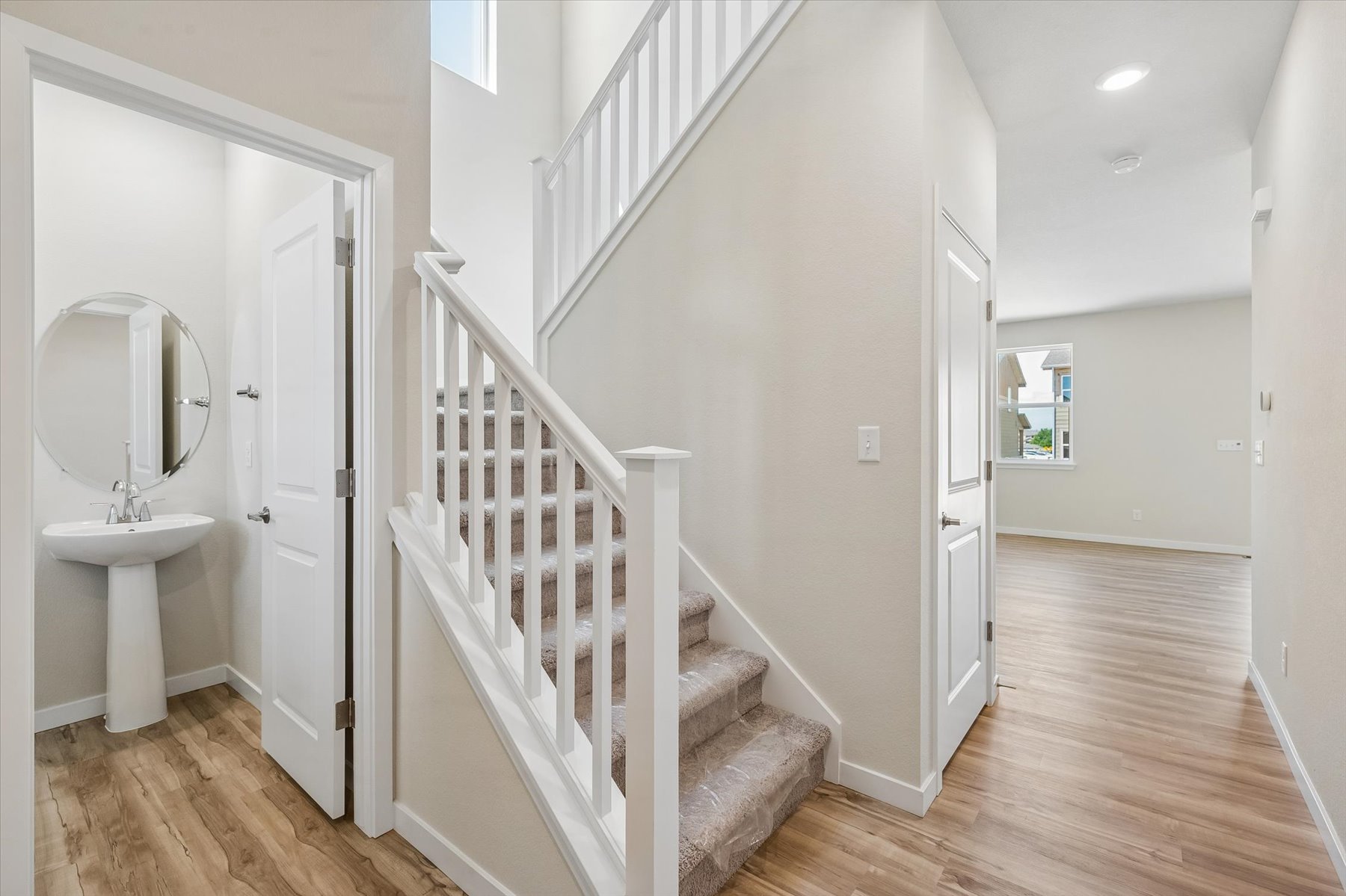 A white staircase in a house.