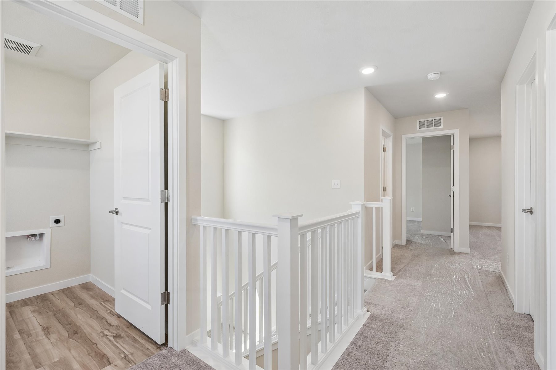 A white staircase in a house.
