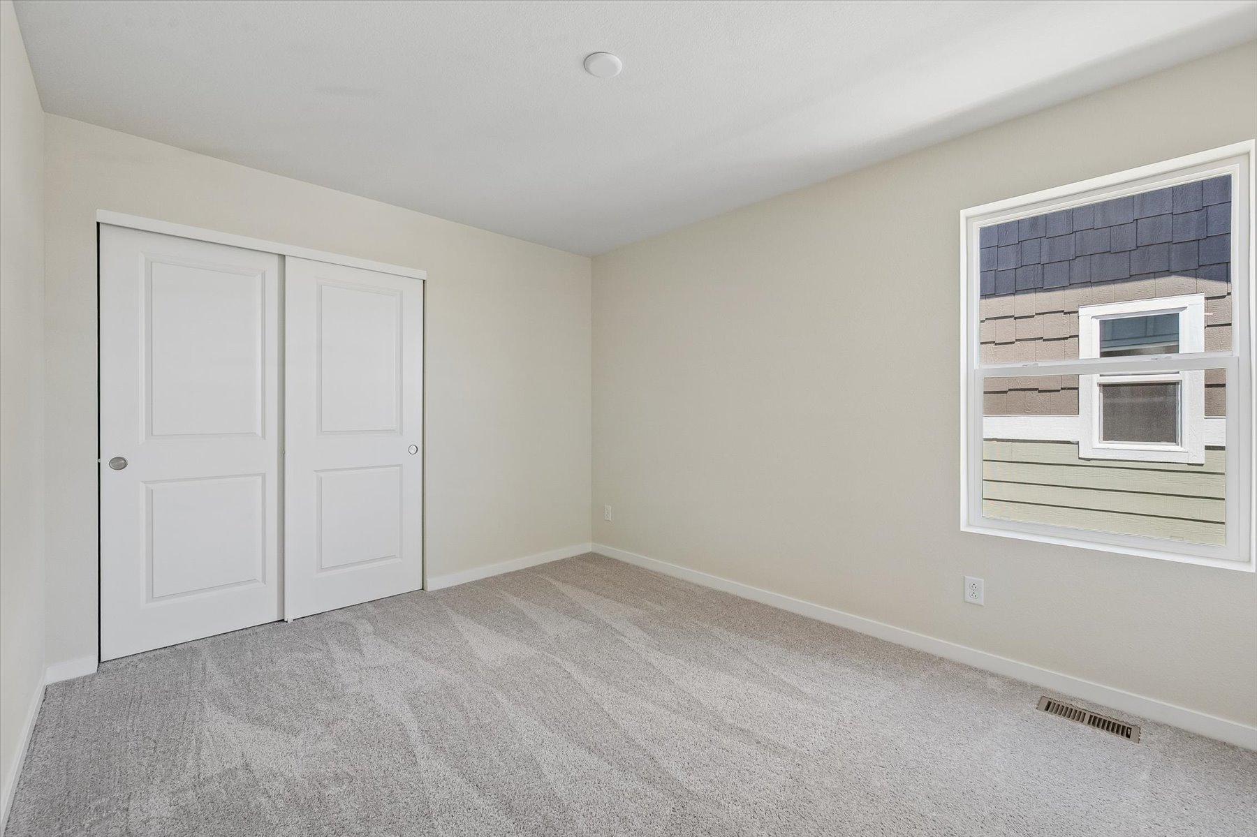 A room with white doors.