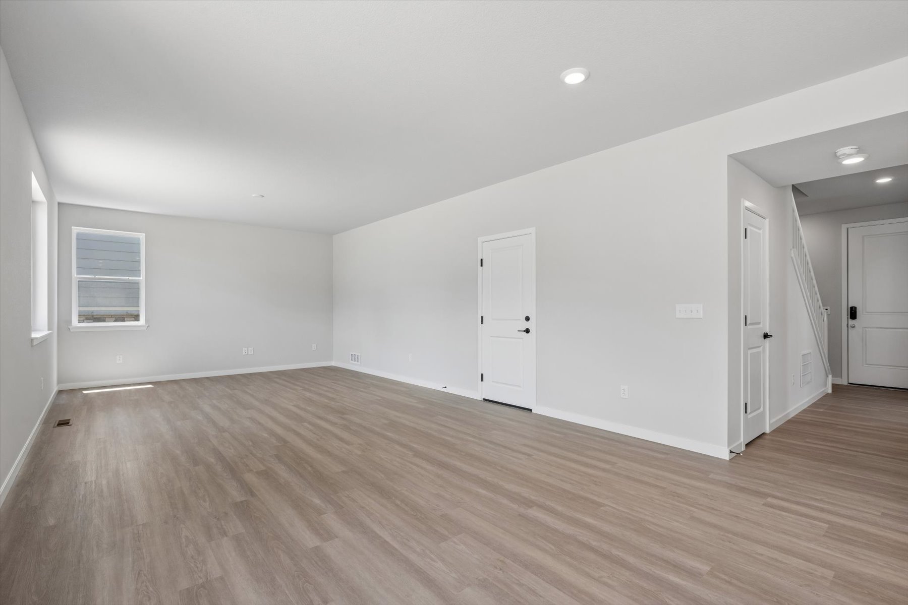 A room with white doors.