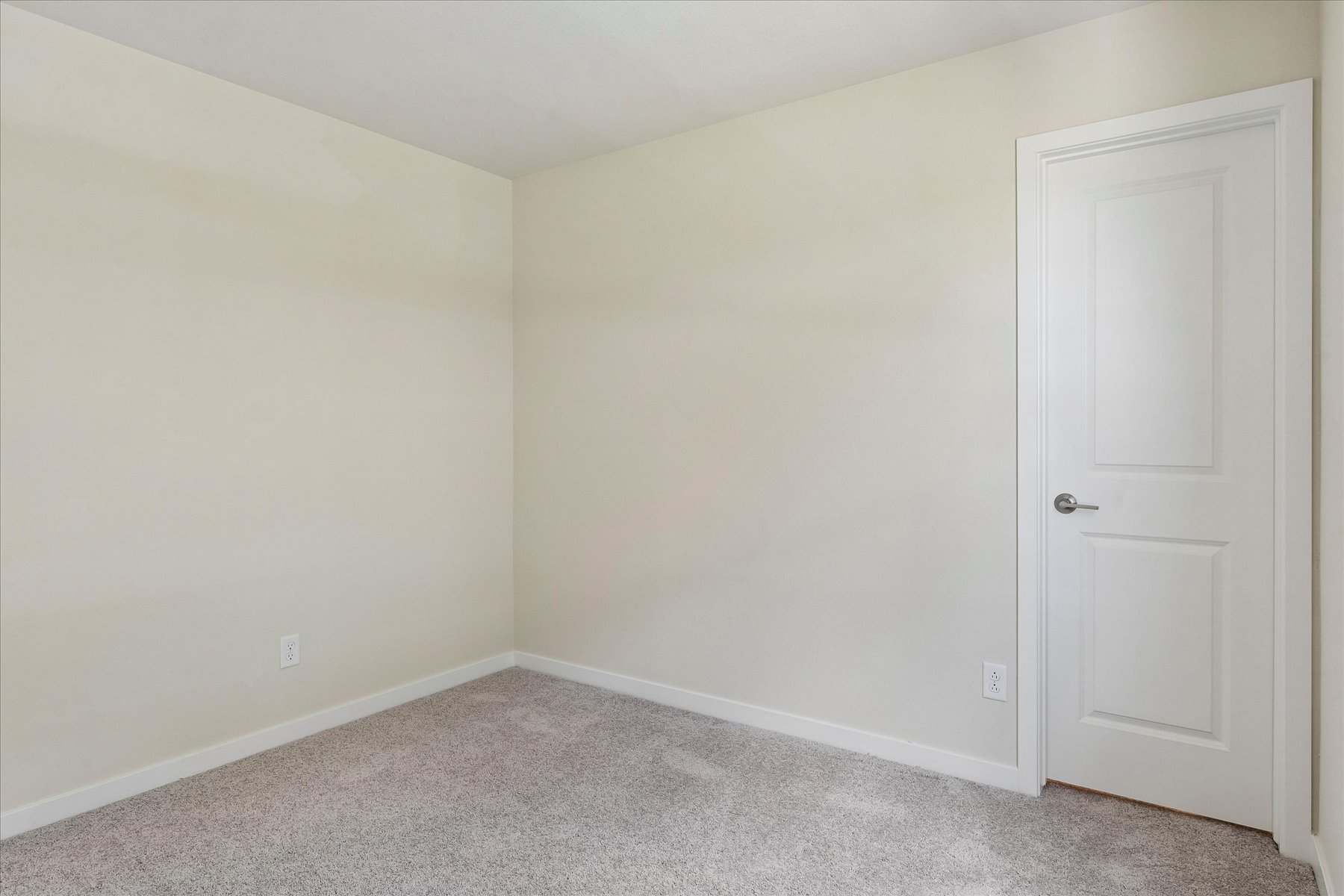 A room with white doors.